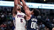 Mar 16, 2025; Dallas, Texas, USA;  Philadelphia 76ers guard Quentin Grimes (5) as Dallas Mavericks guard Max Christie (00) during the second half at American Airlines Center. Mandatory Credit: Kevin Jairaj-Imagn Images