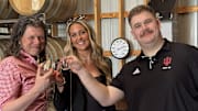 Indiana Media School Associate Dean Galen Clavio, former Indiana women's basketball player Sydney Parrish and former football player Mike Katic pose at Starlight Distillery on Friday.