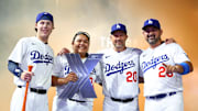 The Dodgers – Grady Emerson, Mya Perez, BP pitcher Jay Stott, and Adrián González celebrate the HRDX victory.