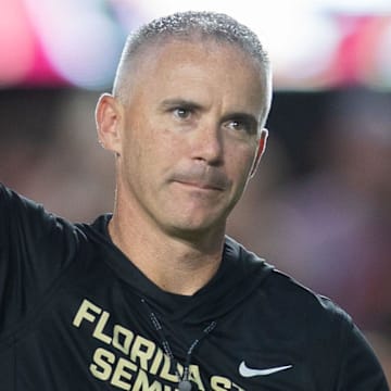 Florida State Seminoles head coach Mike Norvell walks down the field. The Miami Hurricanes lead the Florida State Seminoles 14-3 at the half on Saturday, Oct. 4, 2025.