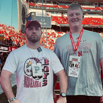 Millard West offensive lineman Matt Erickson with former Husker Will Compton during a visit to Lincoln.