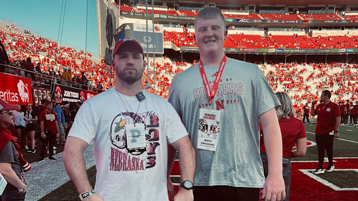 Millard West offensive lineman Matt Erickson with former Husker Will Compton during a visit to Lincoln.