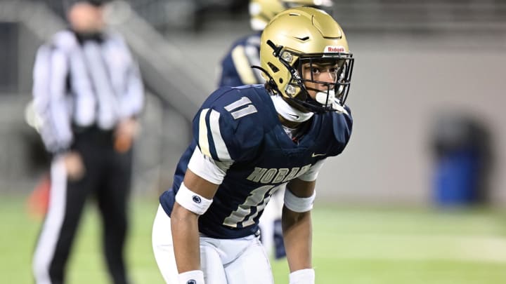 Archbishop Hoban cornerback Elbert "Rock" Hill IV gets ready for a play against Walsh Jesuit in the 2023 OHSAA Division II regional finals