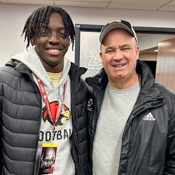 2026 QB Femi Babalola alongside Boston College head coach Bill O'Brien