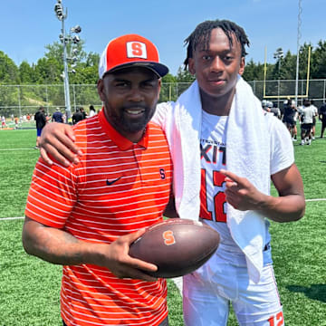 2027 DB Sire Hall and head coach Fran Brown