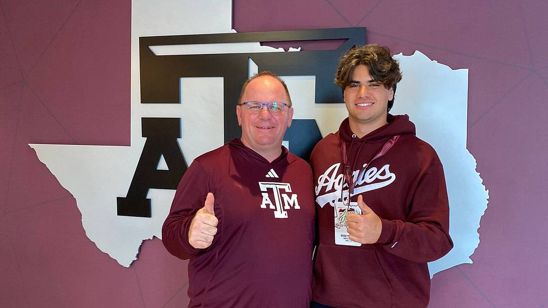 Noah Mikhail with Mike Elko