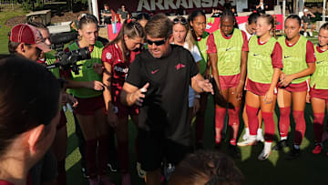 Arkansas coach Coby Hale talks to the Arkansas players before an exhibition match against UT Martin on Tuesday.