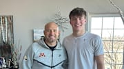 P.J. Fleck (left) with Roman Voss (right) during an in-home visit in January. 