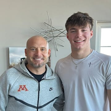 P.J. Fleck (left) with Roman Voss (right) during an in-home visit in January. 