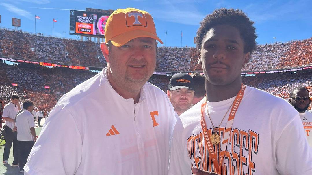 Zion "Ziggy" Dobson with Josh Heupel