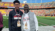 Blake Betton (left) with his father at a Gophers Gameday visit last season.
