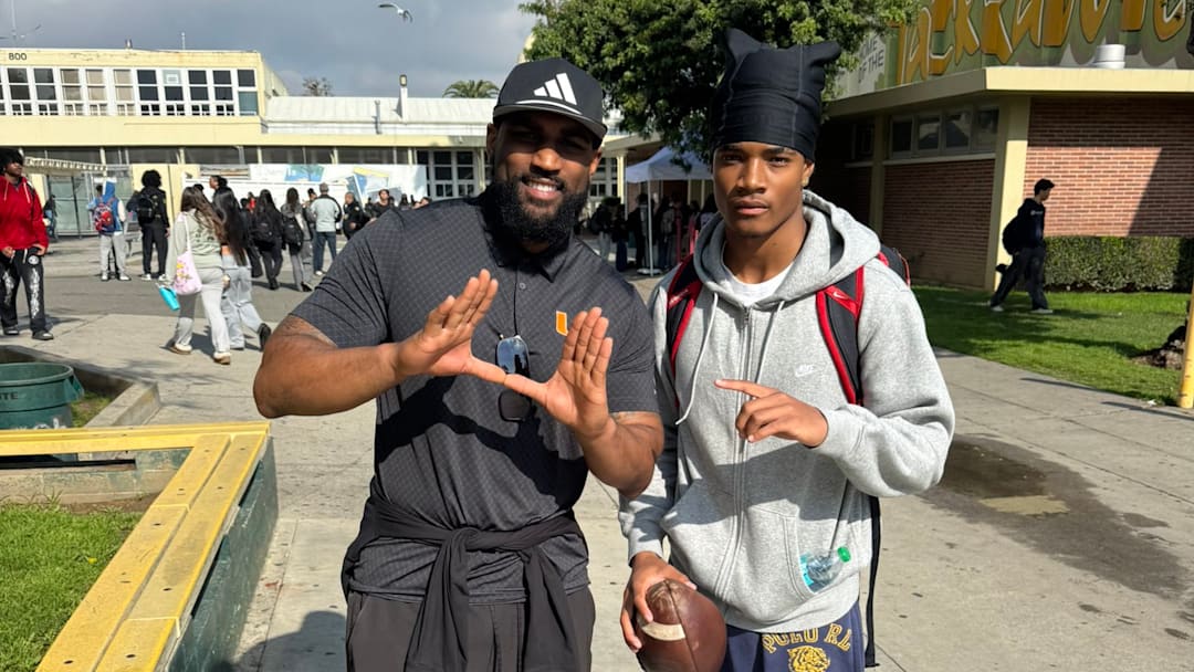 Miami cornerback commit Donte Wright and Miami safeties coach Will Harris pose for a photo. x Miami cornerback commit Donte Wright and Miami safeties coach Will Harris pose for a photo. x