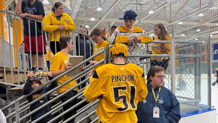 Vitali Pinchuk signs autographs for fans after practice Vitali Pinchuk signs autographs for fans after practice