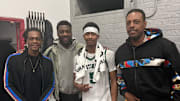 Jason Crowe Jr. (center) poses with (L-R) former Boston Celtics NBA champions Rajon Rondo, Tony Allen and Paul Pierce.