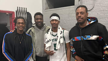 Jason Crowe Jr. (center) poses with (L-R) former Boston Celtics NBA champions Rajon Rondo, Tony Allen and Paul Pierce.