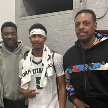 Jason Crowe Jr. (center) poses with (L-R) former Boston Celtics NBA champions Rajon Rondo, Tony Allen and Paul Pierce.