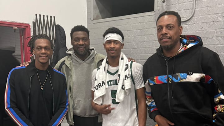 Jason Crowe Jr. (center) poses with (L-R) former Boston Celtics NBA champions Rajon Rondo, Tony Allen and Paul Pierce.