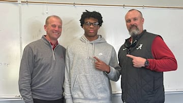2026 LB prospect Nick Abrams II alongside Kalen DeBoer and Chuck Morrell.