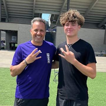 Jedd Fisch and Caden Jones share a UW recruiting moment.