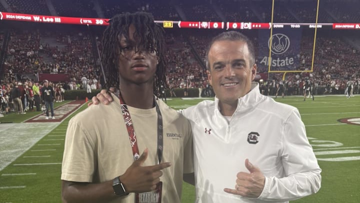 Somourian Wingo with South Carolina head coach Shane Beamer.