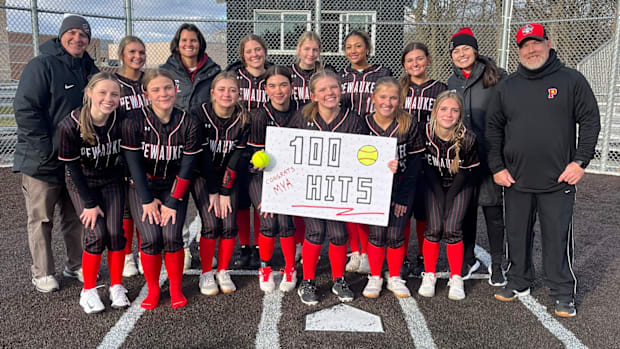 Wisconsin high school softball: Pewaukee's Mya Bloedow (middle) poses with her teammates to commemorate her 100th career hit.
