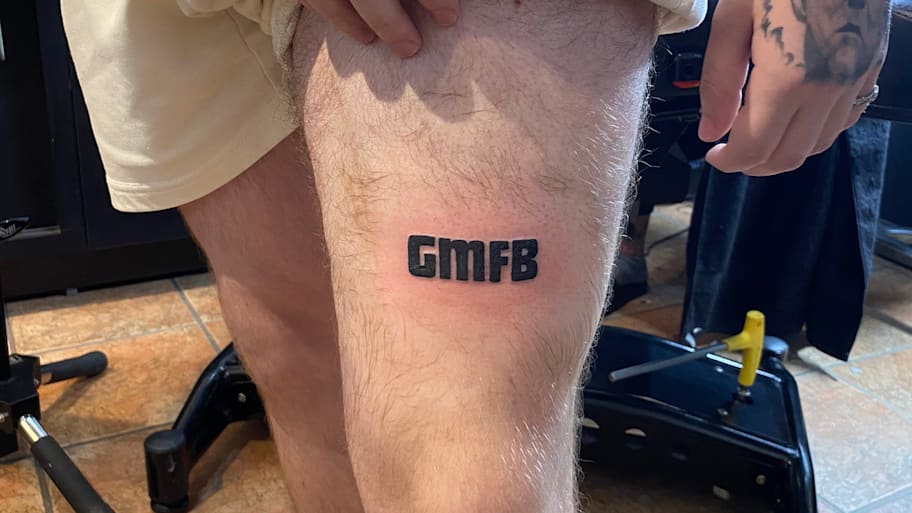 Jarrett Bailey will now permanently don a "GMFB" tattoo. | Screenshot via @JBaileyNFL.