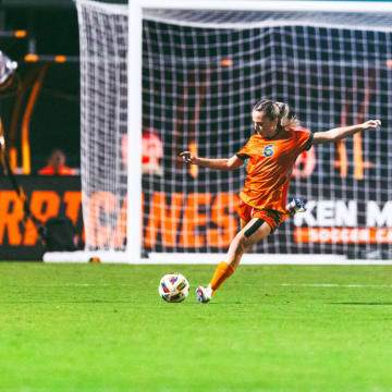 Miami Hurricanes defender. Tori Grambo (6) sending a ball up field against Missouri 