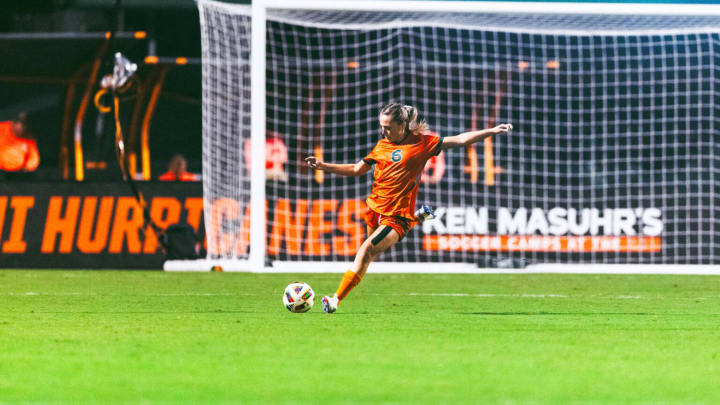 Miami Hurricanes defender. Tori Grambo (6) sending a ball up field against Missouri 