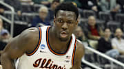 Mar 18, 2022; Pittsburgh, PA, USA;  Illinois Fighting Illini center Kofi Cockburn (21) dribbles the ball against the Chattanooga Mocs during the first round of the 2022 NCAA Tournament at PPG Paints Arena. Mandatory Credit: Charles LeClaire-Imagn Images
