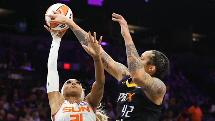 Phoenix Mercury center Brittney Griner (42) blocks Connecticut Sun guard DiJonai Carrington (21) on Friday, Sept. 13, 2024 at Footprint Center in Phoenix.