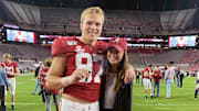 Miller and Abby Forristall celebrating a Crimson Tide win in 2019