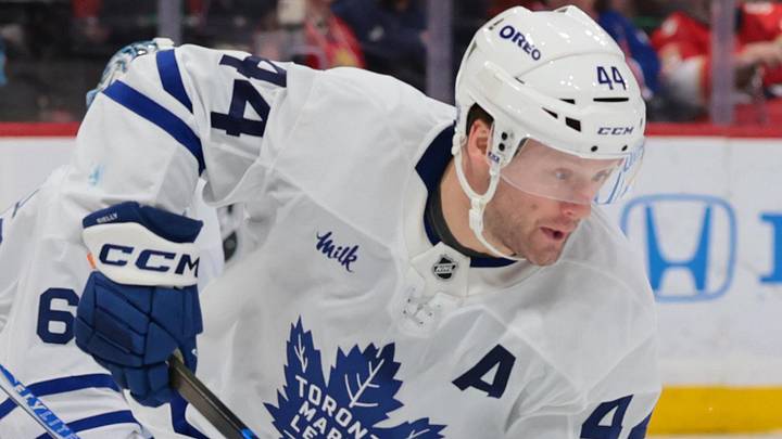 Feb 26, 2026; Sunrise, Florida, USA; Toronto Maple Leafs defenseman Morgan Rielly (44) moves the puck against the Florida Panthers during the third period at Amerant Bank Arena. Mandatory Credit: Sam Navarro-Imagn Images