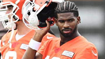 Cleveland Browns quarterback Shedeur Sanders (12) listens to a play call during minicamp at CrossCountry Mortgage Campus.