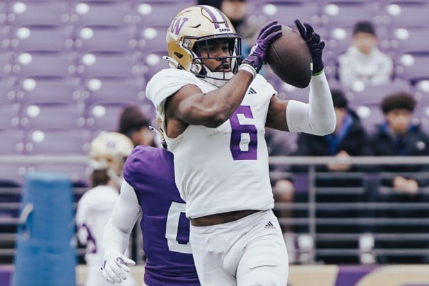 Jeremiah Hunter makes a fall camp grab for the Huskies. 