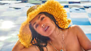 Salma Hayek Pinault was photographed by Ruven Afanador in Mexico. Hat by Alémais. 