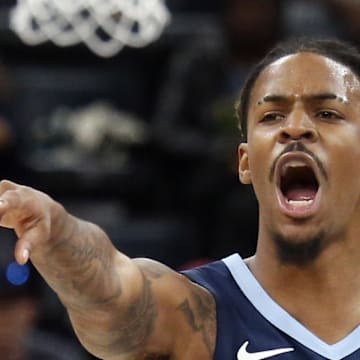 Memphis Grizzlies guard Ja Morant reacts during the first quarter against the Miami Heat.
