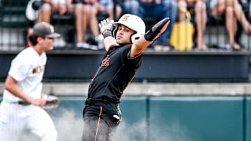 Northville's Dante Nori celebrates after scoring off Joseph Broughton's three-run double against Bay City Western in the fourth inning on Thursday, June 13, 2024, during the D1 baseball state semifinal at MSU's McLane Stadium in East Lansing.