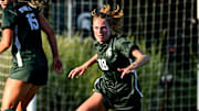 Michigan State's Justina Gaynor, right, goes after the ball after Nebraska's Sarah Weber, left, falls to the turf during the first half on Thursday, Sept. 19, 2024, at DeMartin Stadium in East Lansing.
