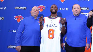 Aug 17, 2021; New York, New York, USA; New York Knicks guard Kemba Walker (8) and guard Evan Fournier (13) pose for a photo with team president Leon Rose (left) and head coach Tom Thibodeau (middle) and general manager Scott Perry (right) during their introductory press conference at Madison Square Garden. Mandatory Credit: Brad Penner-USA TODAY Sports