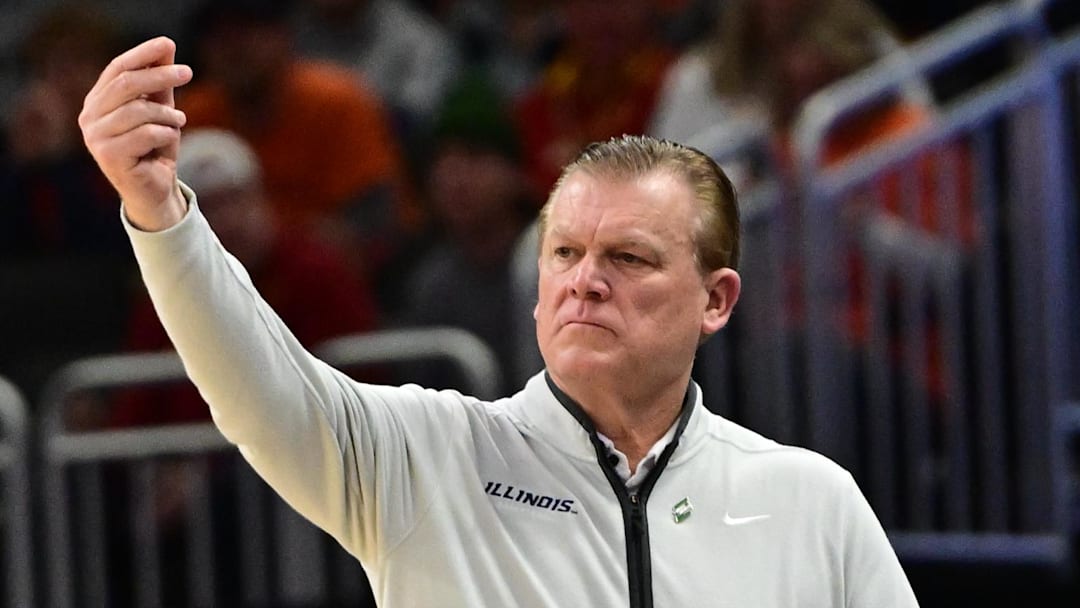 Mar 23, 2025; Milwaukee, WI, USA; Illinois Fighting Illini head coach Brad Underwood reacts during the first half in the second round of the NCAA Tournament against the Kentucky Wildcats at Fiserv Forum. Mandatory Credit: Benny Sieu-Imagn Images Mar 23, 2025; Milwaukee, WI, USA; Illinois Fighting Illini head coach Brad Underwood reacts during the first half in the second round of the NCAA Tournament against the Kentucky Wildcats at Fiserv Forum. Mandatory Credit: Benny Sieu-Imagn Images