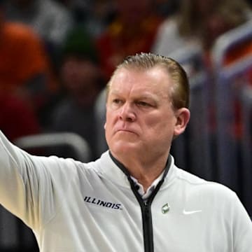 Mar 23, 2025; Milwaukee, WI, USA;  Illinois Fighting Illini head coach Brad Underwood reacts during the first half in the second round of the NCAA Tournament against the Kentucky Wildcats at Fiserv Forum. Mandatory Credit: Benny Sieu-Imagn Images