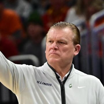 Mar 23, 2025; Milwaukee, WI, USA;  Illinois Fighting Illini head coach Brad Underwood reacts during the first half in the second round of the NCAA Tournament against the Kentucky Wildcats at Fiserv Forum. Mandatory Credit: Benny Sieu-Imagn Images