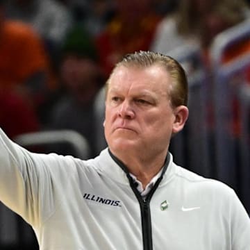 Mar 23, 2025; Milwaukee, WI, USA;  Illinois Fighting Illini head coach Brad Underwood reacts during the first half in the second round of the NCAA Tournament against the Kentucky Wildcats at Fiserv Forum. Mandatory Credit: Benny Sieu-Imagn Images