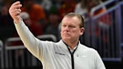 Mar 23, 2025; Milwaukee, WI, USA;  Illinois Fighting Illini head coach Brad Underwood reacts during the first half in the second round of the NCAA Tournament against the Kentucky Wildcats at Fiserv Forum. Mandatory Credit: Benny Sieu-Imagn Images