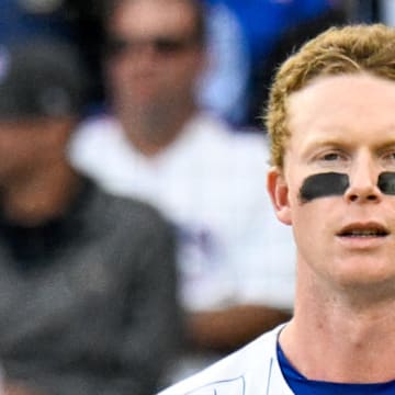 Oct 1, 2025; Chicago, Illinois, USA; Chicago Cubs outfielder Pete Crow-Armstrong (4) tosses his bat after striking out in the seventh inning against the San Diego Padres during game two of the Wildcard round for the 2025 MLB playoffs at Wrigley Field. 