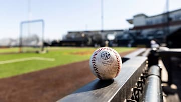 A baseball sits on the railing at Taylor Stadium in Columbia, Missouri. 