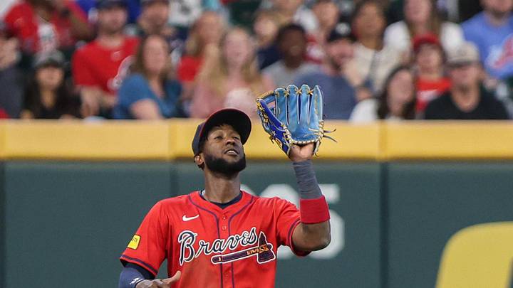 Sep 26, 2025; Cumberland, Georgia, USA; Atlanta Braves outfielder Jurickson Profar (7) catches a fly ball for an out against Pittsburgh Pirates during the seventh inning at Truist Park.
