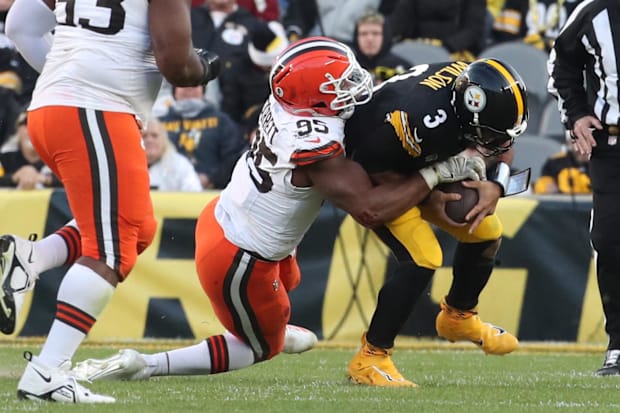Cleveland Browns defensive end Myles Garrett (95) sacks Pittsburgh Steelers quarterback Russell Wilson