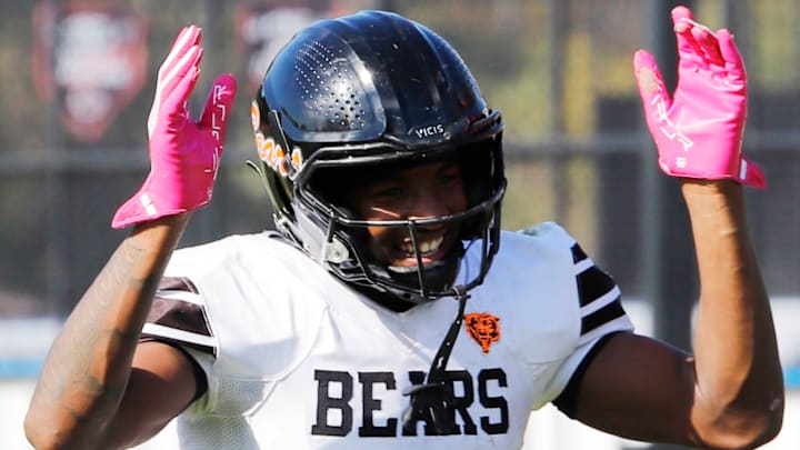Clairton's Brandon Murphy celebrates after a teammate scored a touchdown during the Bears' 66-0 win over Riverview Saturday at Riverside Park in Oakmont. Clairton improved to 7-1 with the win.