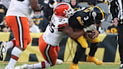 Dec 8, 2024; Pittsburgh, Pennsylvania, USA;  Cleveland Browns defensive end Myles Garrett (95) sacks Pittsburgh Steelers quarterback Russell Wilson (3) during the fourth quarter at Acrisure Stadium. Mandatory Credit: Charles LeClaire-Imagn Images